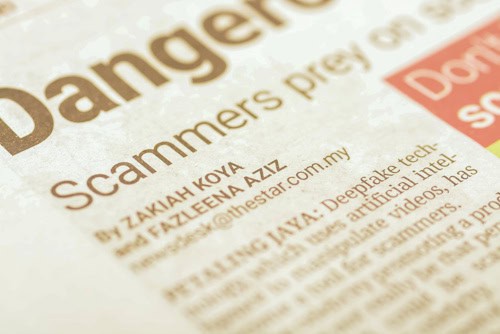 scammers headline in newspaper